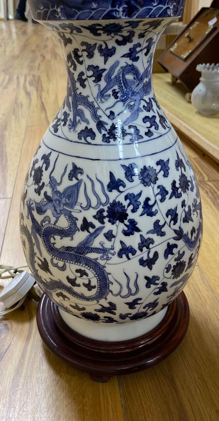 A modern Chinese blue and white dragon vase / table lamp